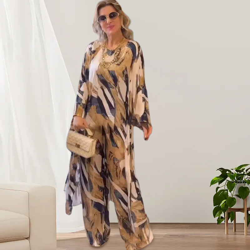 š¦Gratis verzending-49% KORTINGšBedrukte top met lange achterzoom, losse broek, 2-delige set.