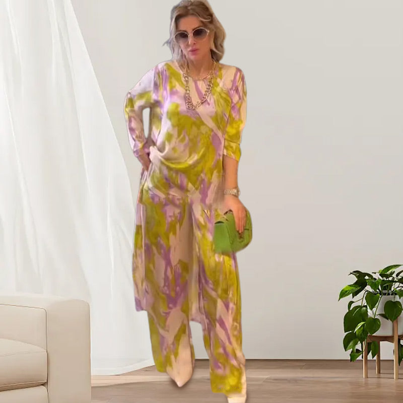 š¦Gratis verzending-49% KORTINGšBedrukte top met lange achterzoom, losse broek, 2-delige set.