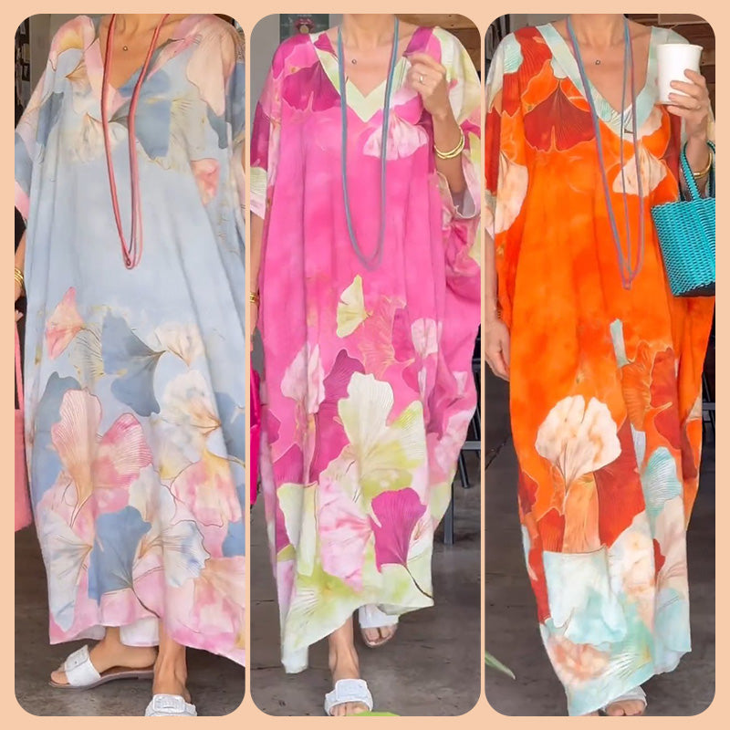 Lange jurk met bloemenprint en halve mouwen