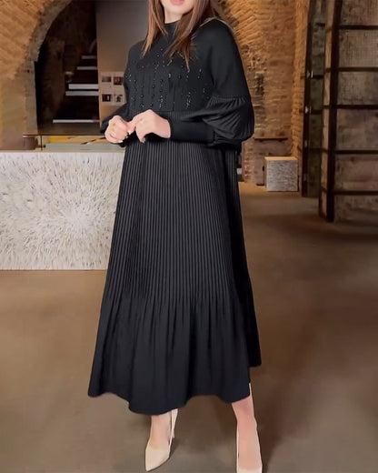 Elegante jurk met lantaarnmouwen in effen kleur