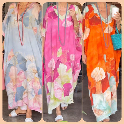 Lange jurk met bloemenprint en halve mouwen